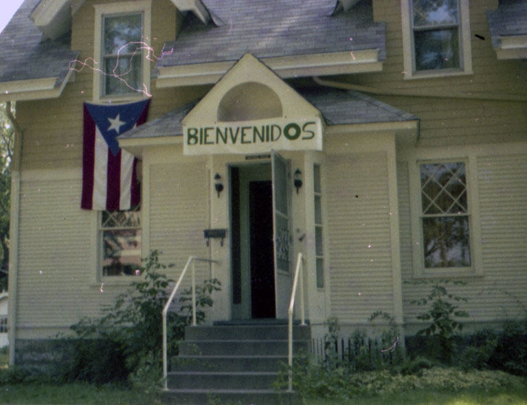 Front of the Hispanic House with a Bienvenidos banner