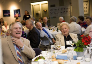 Seated members of the Class of 1951 at a dinner in 2006