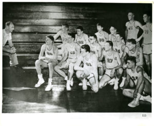 Basketball Team on Bleachers with Coach