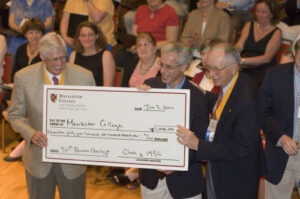 Class of 1956 50th Reunion Big Check for Macalester
