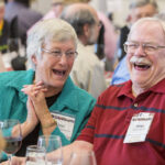 Two laughing members of the Class of 1966 at Reunion 2016 Class Dinner