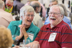 Two laughing members of the Class of 1966 at Reunion 2016 Class Dinner