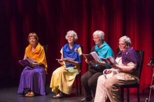 Four members of the Class of 1966 on stage during a Trojan Women Reprisal at Reunion 2016