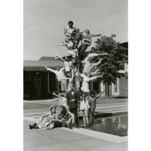 Students in the Drama Club Spring 1969 posing on a sculpture in the Janet Wallace courtyard