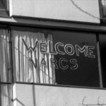 "Welcome Narcs" signed in a dorm window
