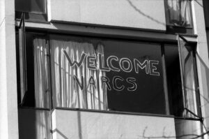 "Welcome Narcs" signed in a dorm window