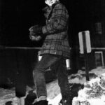 Student packing a snowball