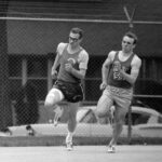 MIAC track meet, Spring 1969. Ben Ahles on left and an unidentified Hamline runner