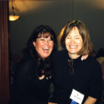 Candid photo - friends Mary Eichhorn-Hicks and Cynthia Jones Laybourn laughing