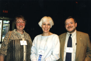 Candid photo of Michael and Marge McPherson with Candyce Clayton in the center