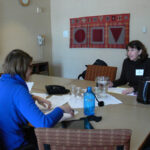 Photo of Reunion 2011 committee actively working with Alison Morris '86