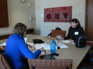 Photo of Reunion 2011 committee actively working with Alison Morris '86