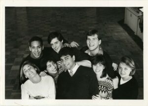 Photo of group of students crowded together, taken in Cochran Lounge in the Student Union circa 1985
