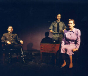 Three performers on stage in Conduct of Life, Spring 1991