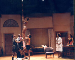 Performers on stage in What the Butler Saw Spring 1988