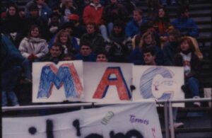 Photo of fans holding up a M A C sign at Women's Soccer 1989