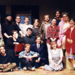 Photo of cast of Escape from Happiness on stage along with Theater faculty Sears Eldredge April 1995