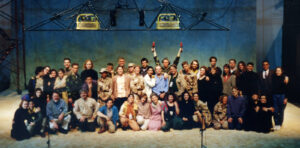 Cast of Iphigenia, performed Spring 1993, standing and kneeling in a large group on stage