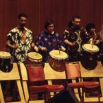 Students drumming in the African Music Ensemble Spring 1994