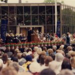President Gavin speaking at the podium at Commencement 1996