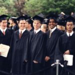 Row of students in caps and gowns at Commencement 1996