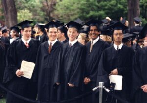 Row of students in caps and gowns at Commencement 1996