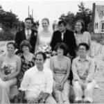 Group photo of alumni at a wedding