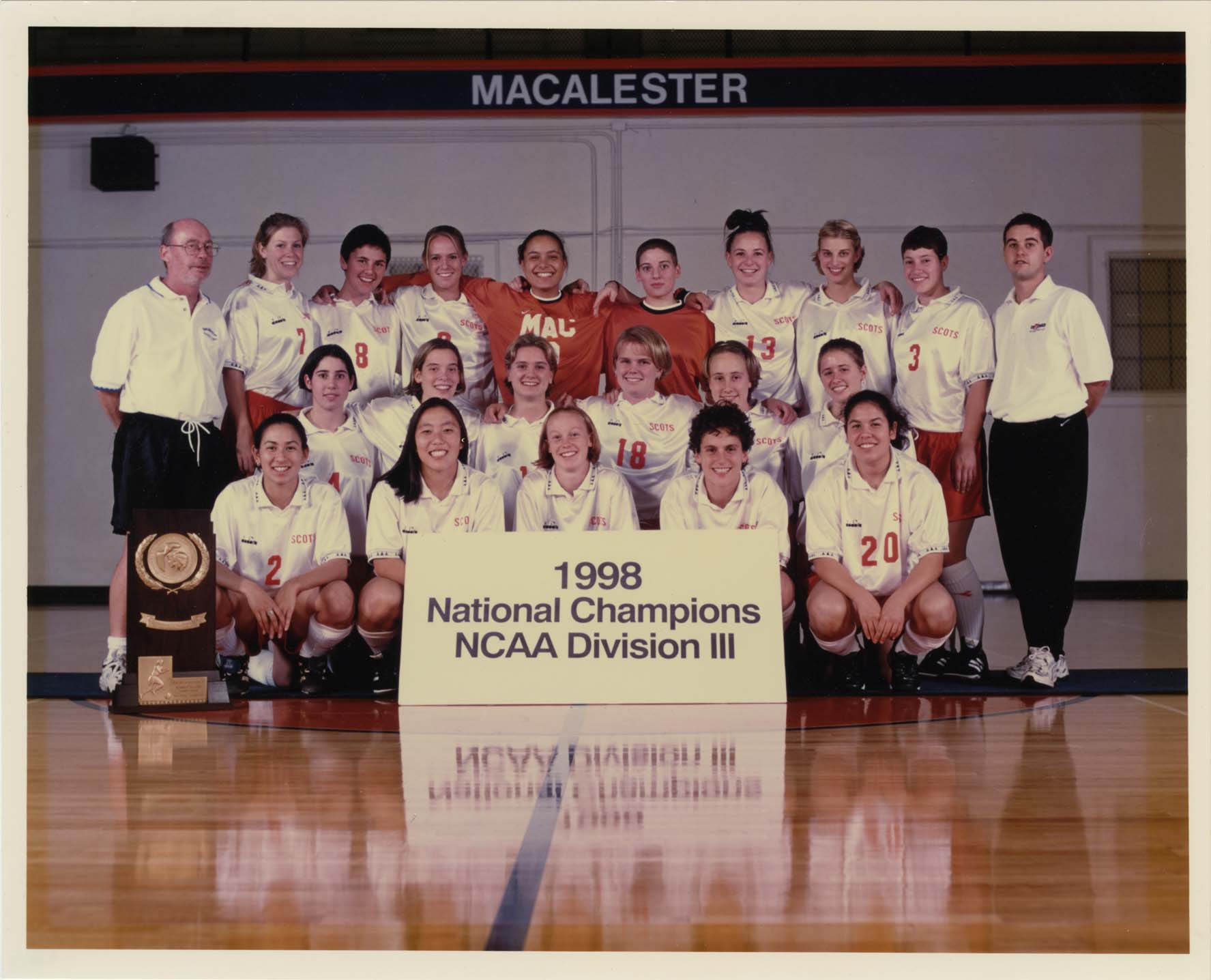 Group photo of Mac women's soccer in 1998 as National Champions for NCAA Division III
