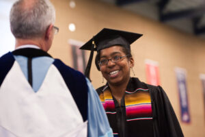 A close up of Jaye Gardiner during Commencement