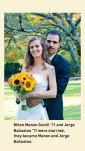Wedding photo: Manon holding bouquet of sunflowers, Jorge standing behind her