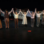 Fall production, performers taking a bow