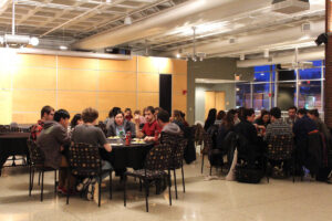 students gathered around tables in Kagin ballroom