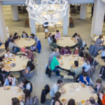 overhead view of students eating in the Smail gallery